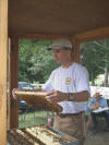 08 Alamance Farm Hertiage Day - Rick Dailey in bee cage - 09.jpg (88788 bytes)