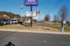 Alan Millhone at Sleep Inn sign.jpg (144132 bytes)