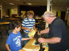 JR Smith,Secretary of NCCA presents Alex and Trey each a trophy  09NC 037.jpg (160644 bytes)