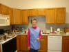 Mrs. Frances McClintock in kitchen.jpg (96585 bytes)