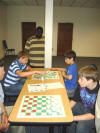 NC Youth playoff between Trey & Alex with several youth watching, Cliff Harris-bkgrd, Lucas Atkins  09NC 034.jpg (216952 bytes)
