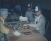 (L) Jim Truitt of Marietta, GA  vs Cecil Lowe of Colerain, Raleigh Johnson watching.jpg (78195 bytes)